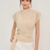 Half-high neck short-sleeve women's top with off-white fabric, waist-cinching design, and button closure