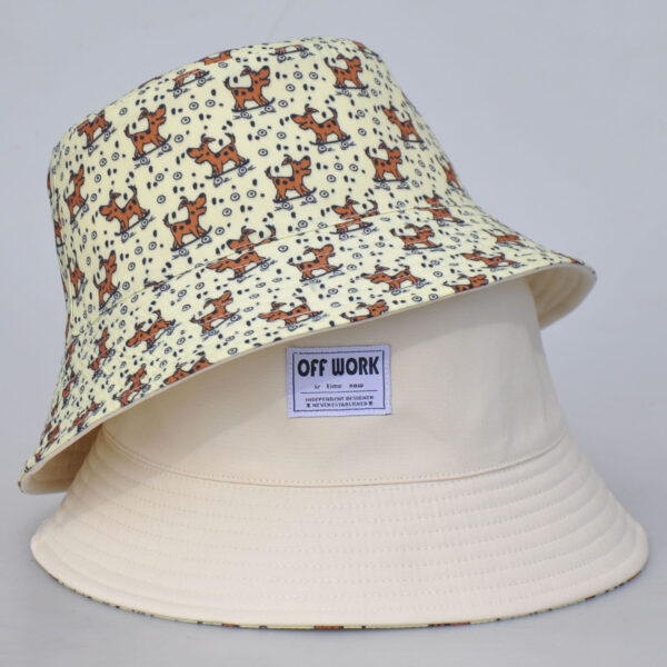 26090036_1 Skateboarding Puppy Reversible Bucket Hat